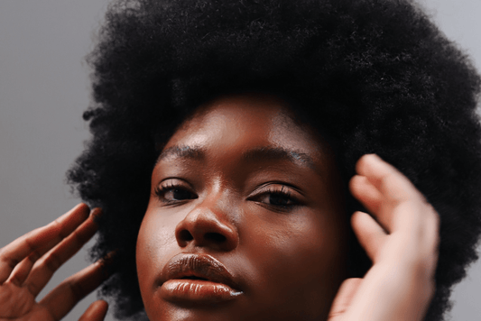 Black woman with 4c afro hair texture